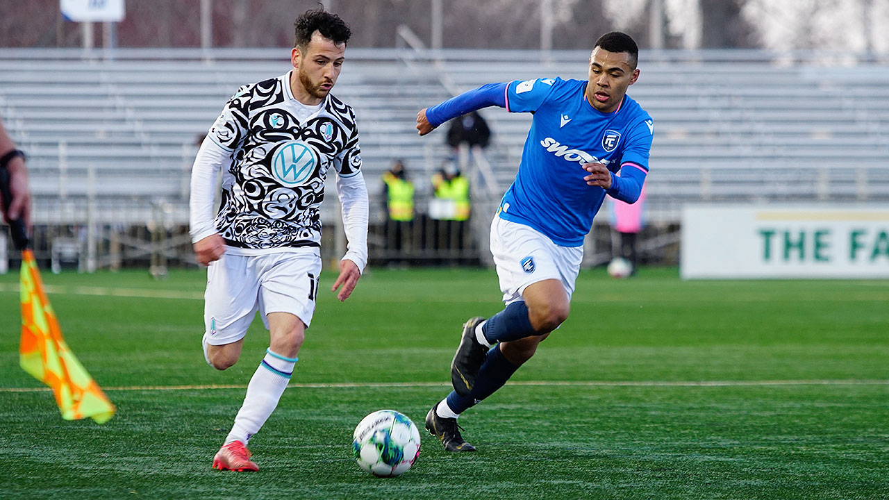 Marco Bustos (left) in action for Pacific in 2022 against FC Edmonton (Photo credit: CPL)