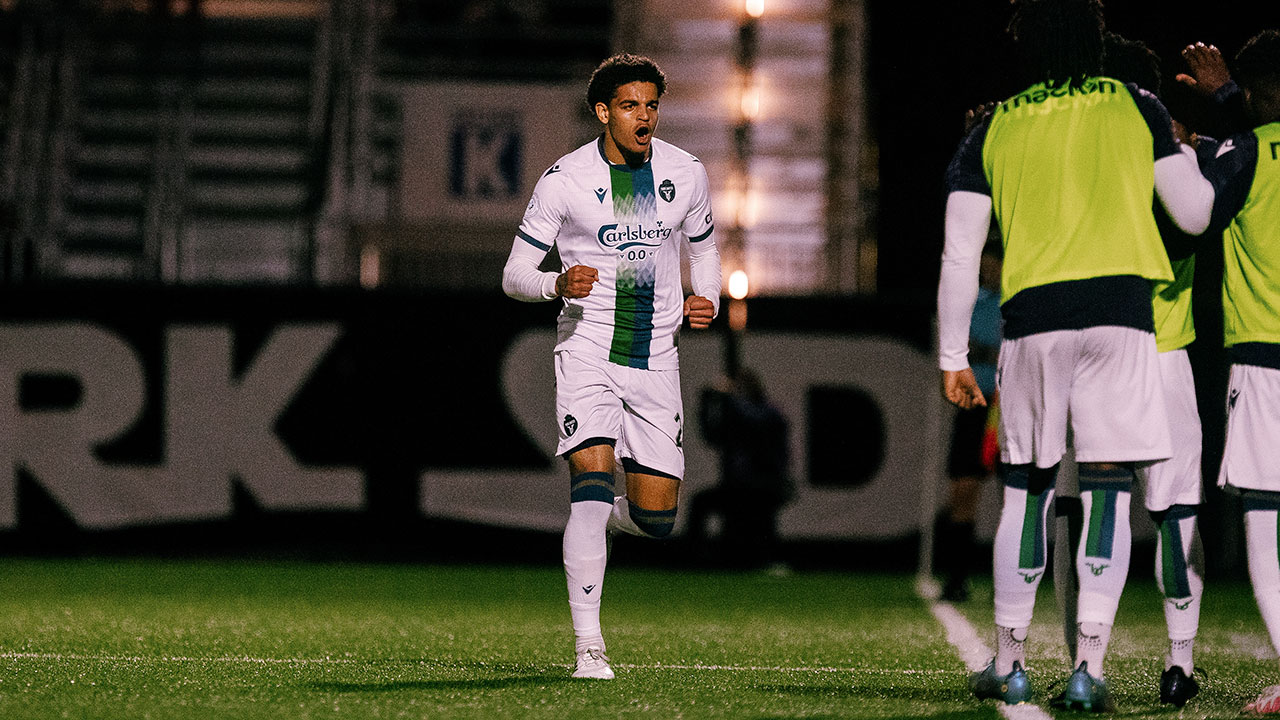 Osaze De Rosario running to his teammates after scoring a goal against Vancouver FC on October 6, 2023 (Photo credit: Beau Chevalier / Vancouver FC)