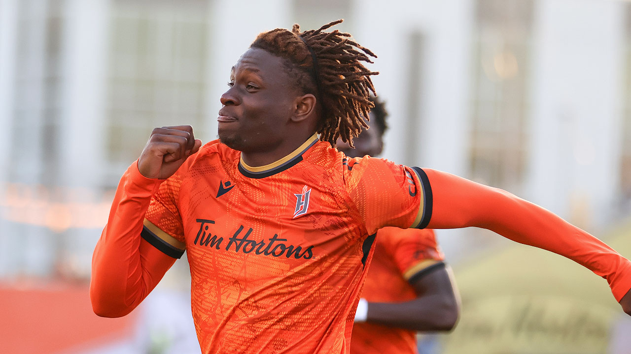 Malik Owolabi-Belewu celebrates after scoring against Atl&eacute;tico Ottawa in the 2024 Canadian Premier League playoffs (Photo credit: Thiago Szwarc / TrueNorthFoot)
