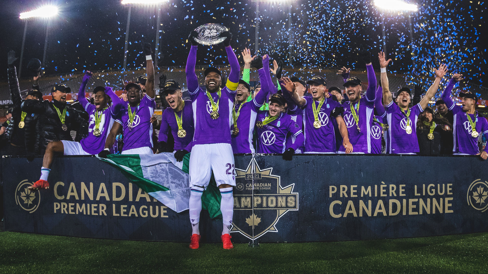 Jamar Dixon of Pacific FC lifts the North Star Shield at Tim Hortons Field on December 5, 2021 (Photo credit: David Chant)