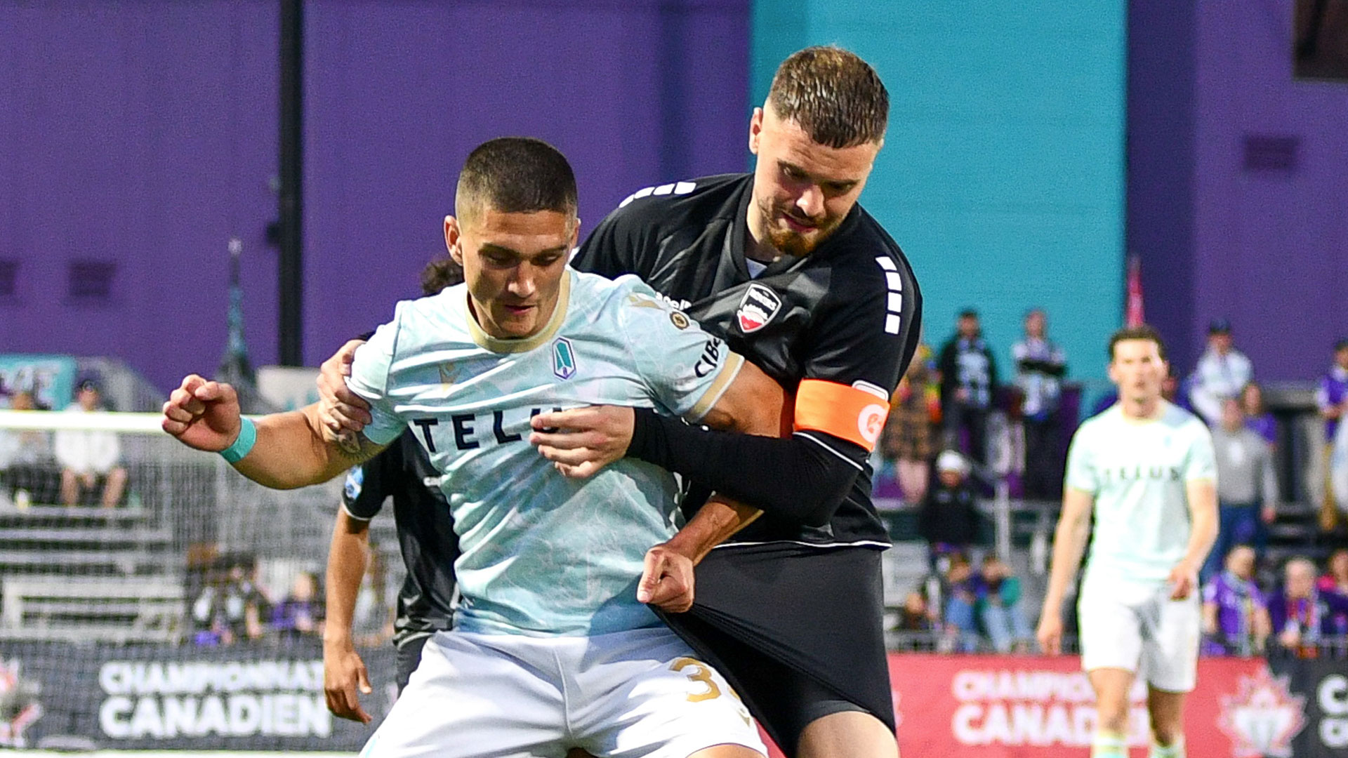 Manny Aparicio of Pacific FC and Matteo Polisi of TSS Rovers fighting for the ball in a Canadian Championship match on May 10, 2023 (Photo credit: Sheldon Mack)