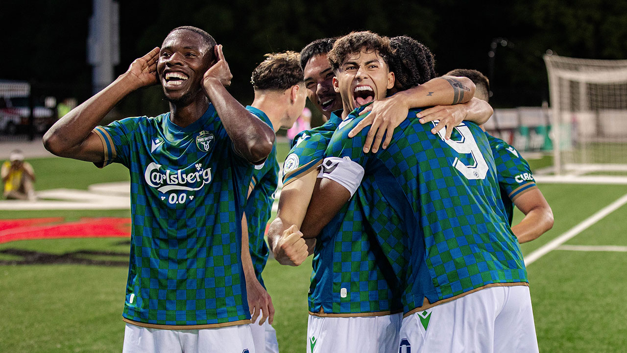 York United players celebrate after scoring against Atlético Ottawa (Photo credit: John Jacques / Northern Tribune)